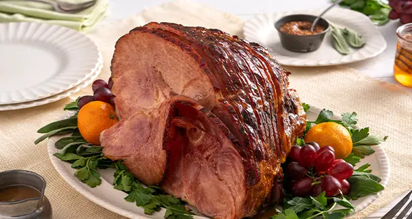 Slow cooker honey glazed ham on a serving platter