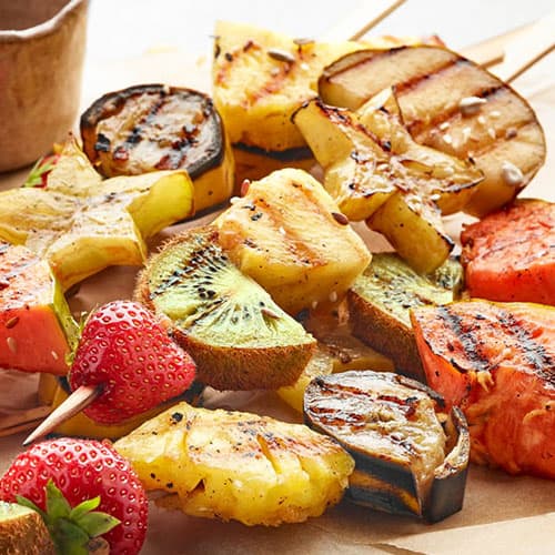 Grilled mango, kiwi, pineapple and strawberries on a kabob