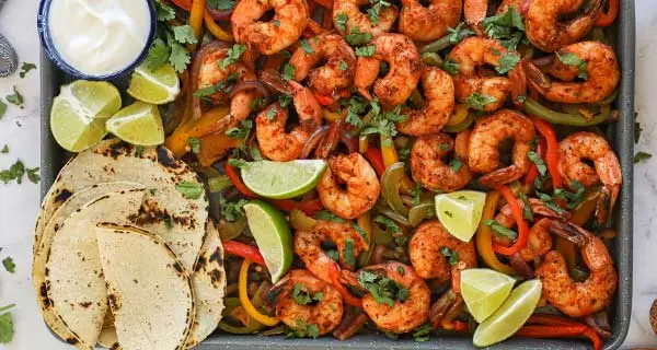 Shrimp Fajitas ingredients on a sheet pan