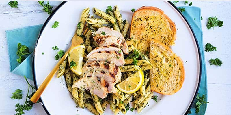 Chicken basil pesto pasta in a dish