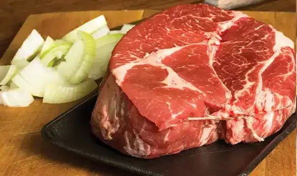 Sprouts Beef on a cutting board