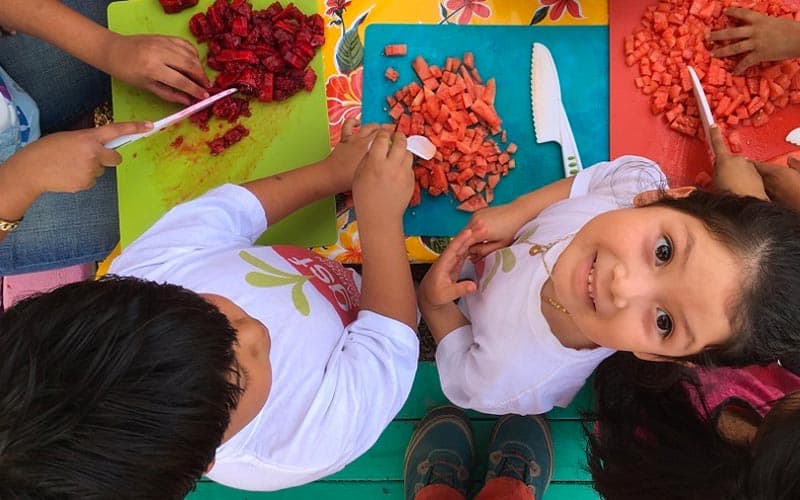 kids learning to cook food