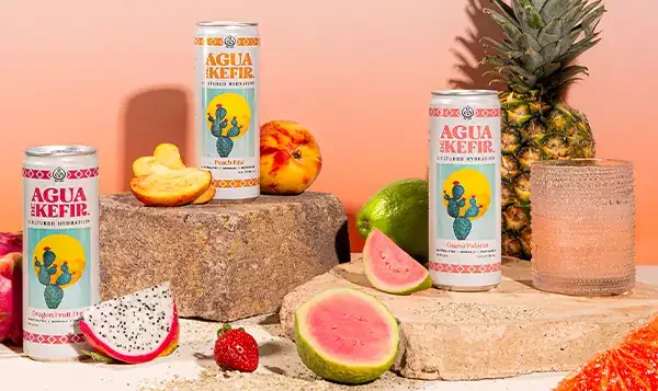 Aqua de Kefir surrounded by fruits