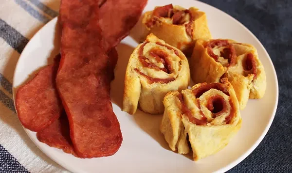 Turkey Bacon next to cinnamon rolls