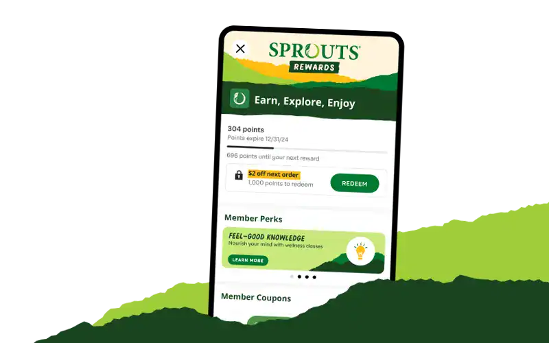 Phone with Sprouts Rewards open on the screen