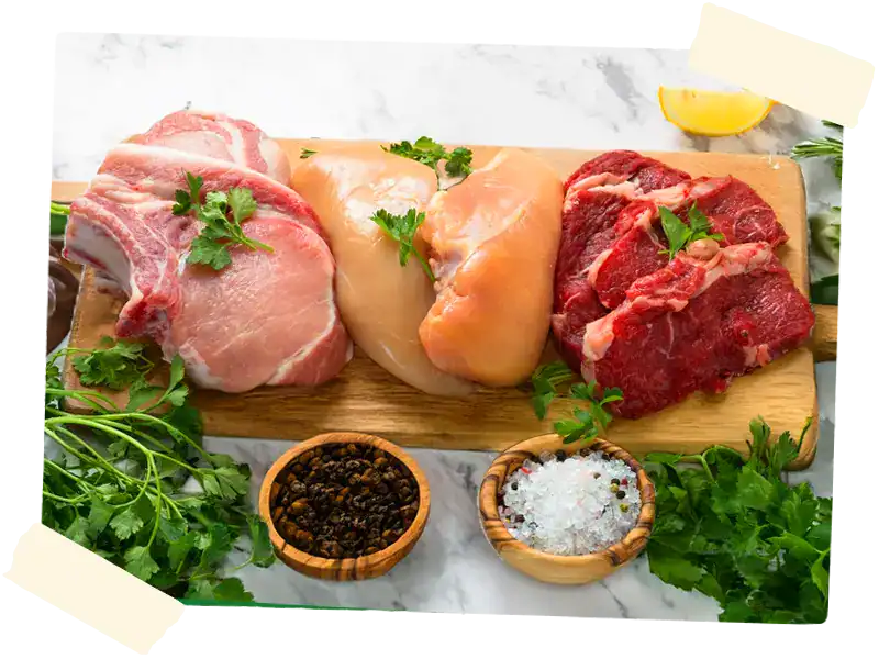 Pork, Chicken and Beef cutlets on a cutting board